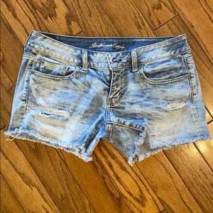 Distressed denim shorts